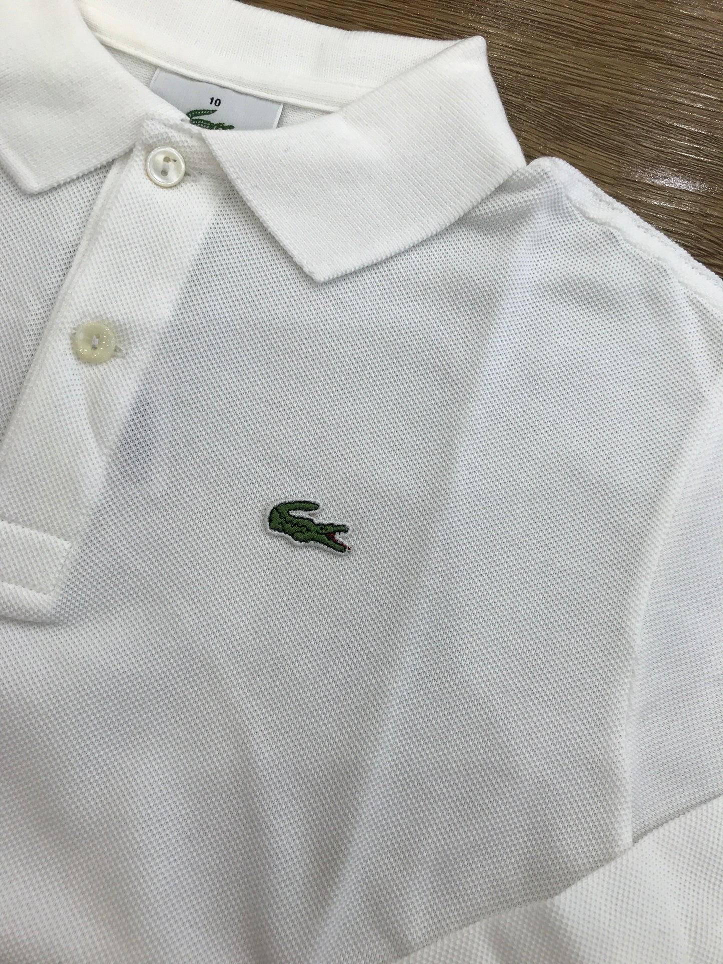 Polo Lacoste manica lunga con polsini e bottoncini