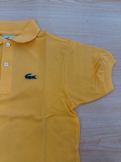 Polo Lacoste in cotone mezza manica con bottoncini e logo ricamato lateralmente unisex