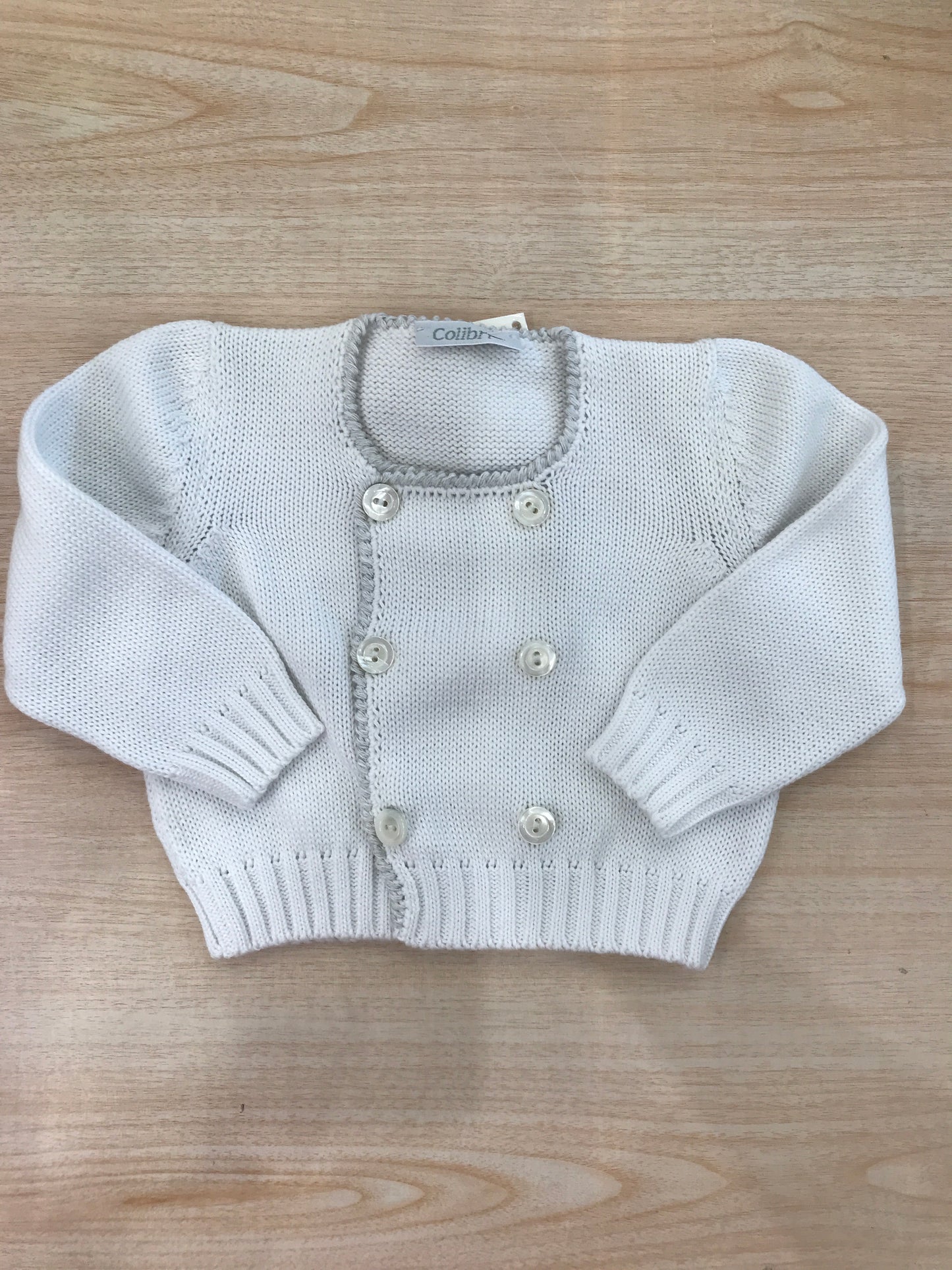 Cardigan Colibrì in filo bianco doppio petto con bottoncini e rifiniture grigie