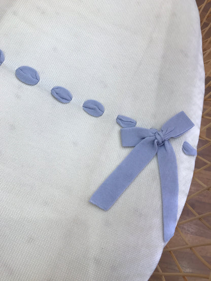 Coperta Baby Lord in lana panna con passanastro celeste e fiocco