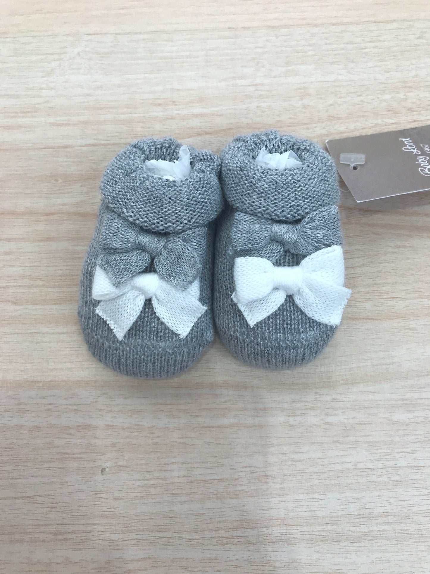 Babbucce Baby Lord in filo grigio con fiocchetti bianchi e grigi