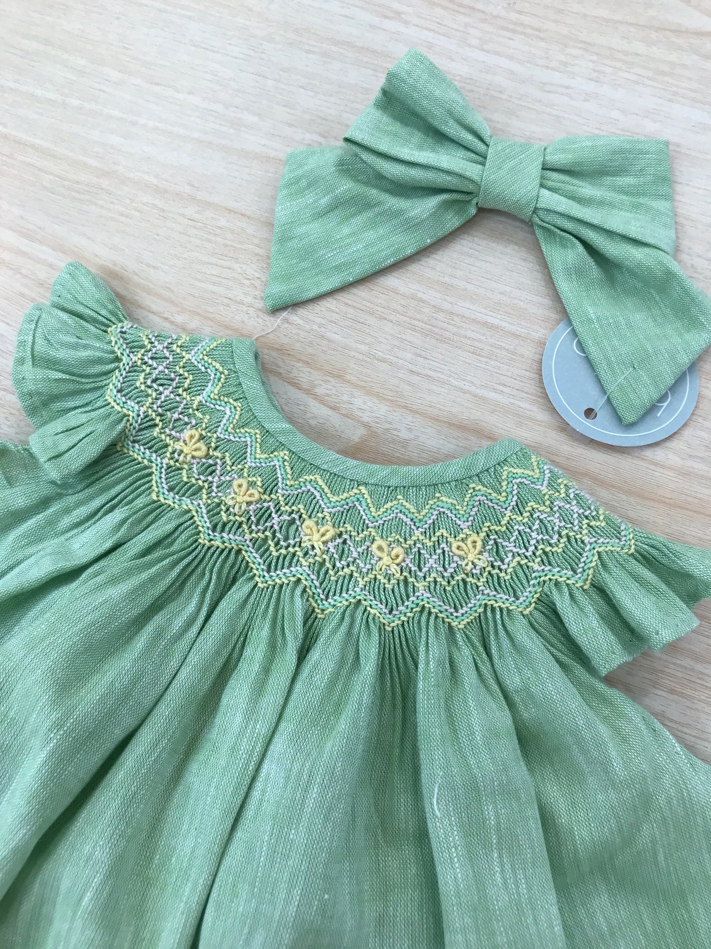 Completo Belan in cotone verde due pezzi abitino smanicato con lavorazione sul corpetto culotte abbinata