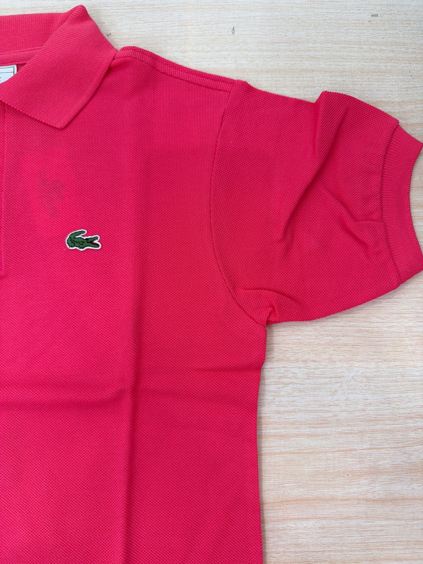 Polo Lacoste in cotone mezza manica con bottoncini e logo ricamato lateralmente unisex