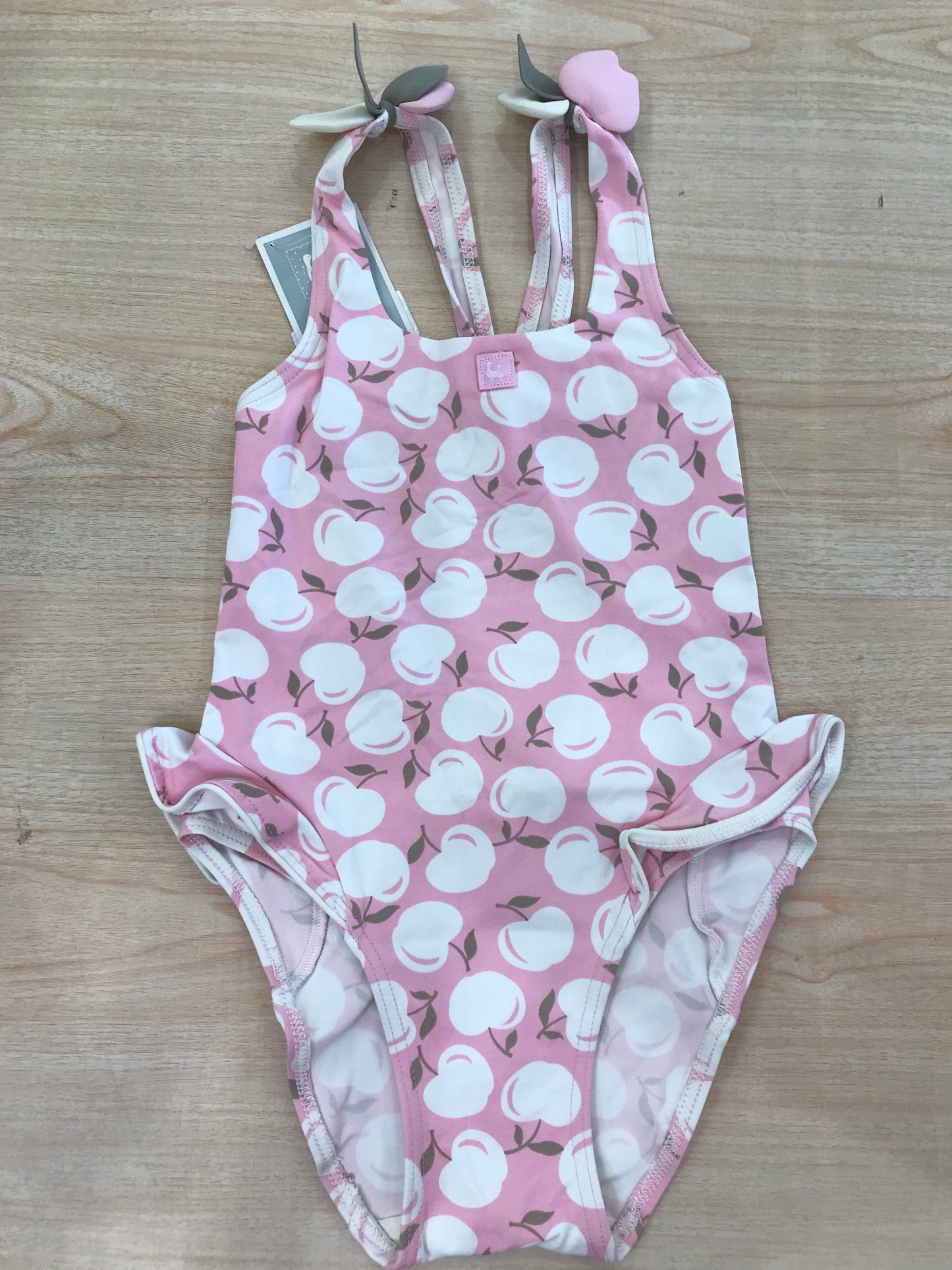 Costume Al Agua Patos intero con rusche con bretelle con foglie sul davanti con pomodori bianchi su tutt'esso
