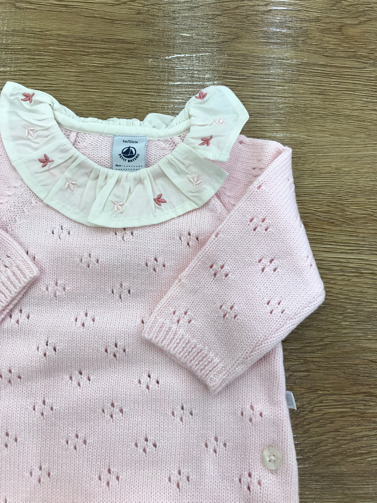 Tutina Petit Bateau intera rosa traforata con collo con rusche e ricami