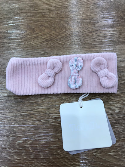 Fascia Nanan in ciniglia a costine con elastico sul retro e fiocchetti sul davanti