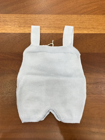 Salopette Baby Lord in filo celeste con bretelle con fiocco bianco centrale