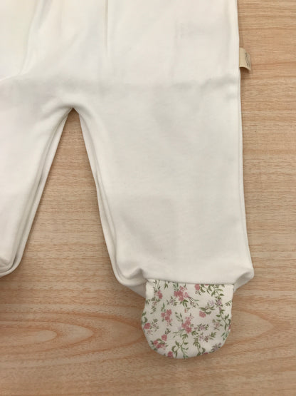 Tutina Baby Gi in cotone manica lunga gamba lunga con piedini rifiniti con fiorellini doppia rusche al collo a quadretti bianchi e verdi e con fiori