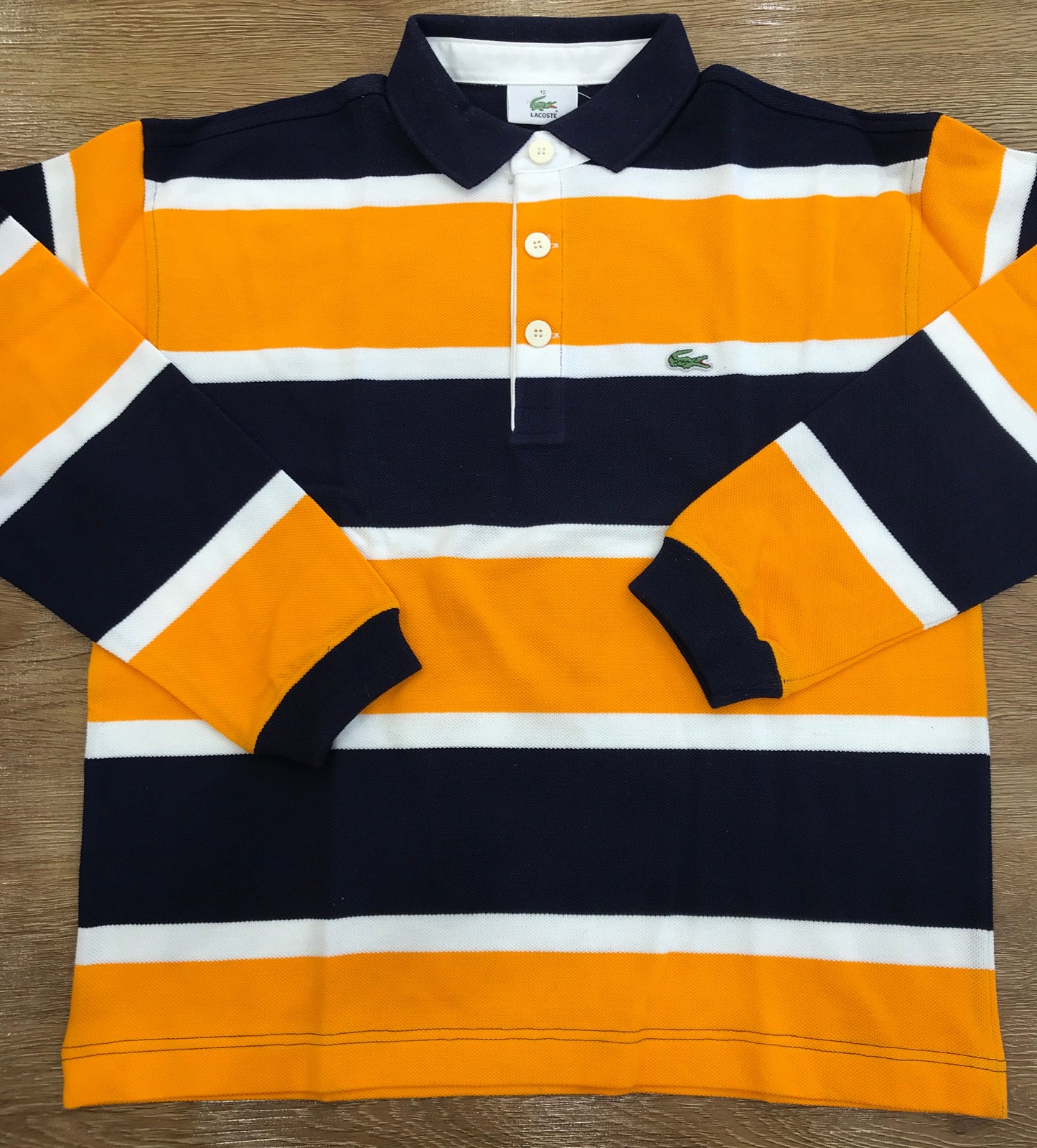 Polo Lacoste manica lunga con polsini e bottoncini