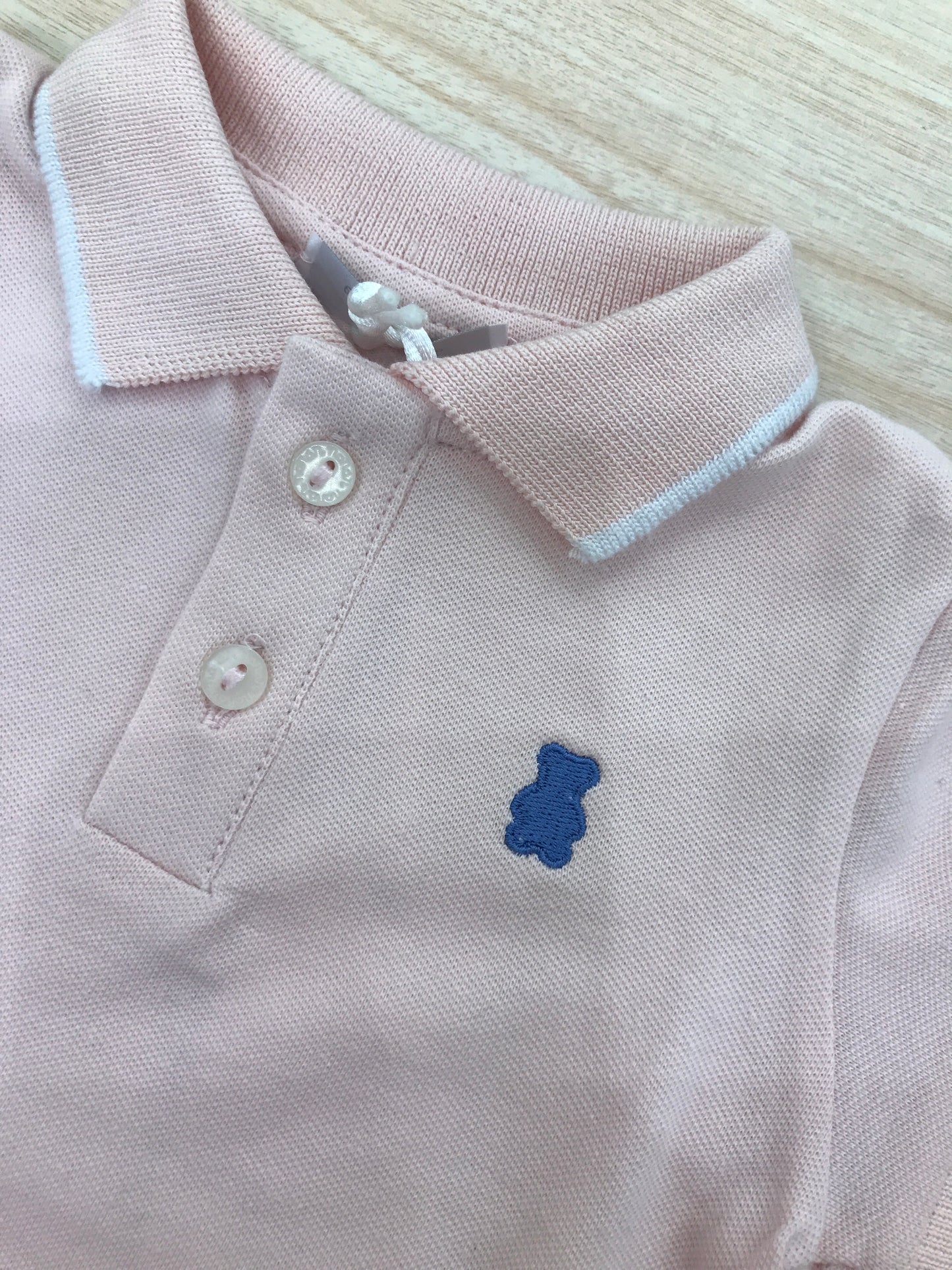 Polo Nanan in cotone mezza manica rosa con rifiniture bianche