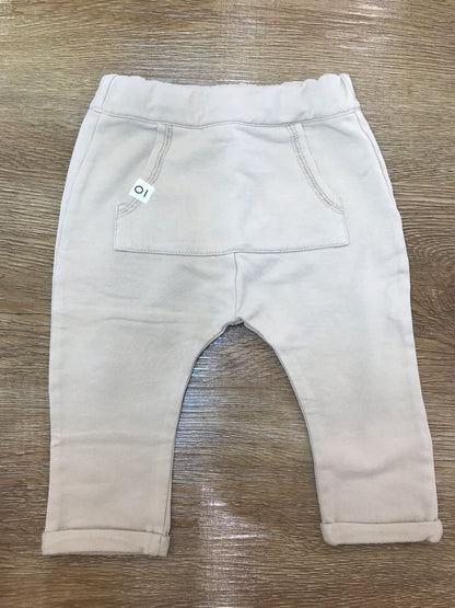 Pantalone Coccodè di tuta beige con tasca sul davanti ed elastico in vita