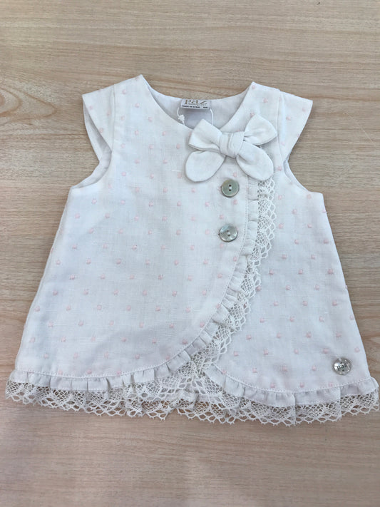 Abito Paz Rodriguez in cotone smanicato con pois rosa con rusche e bottoni trasversali con fiocco