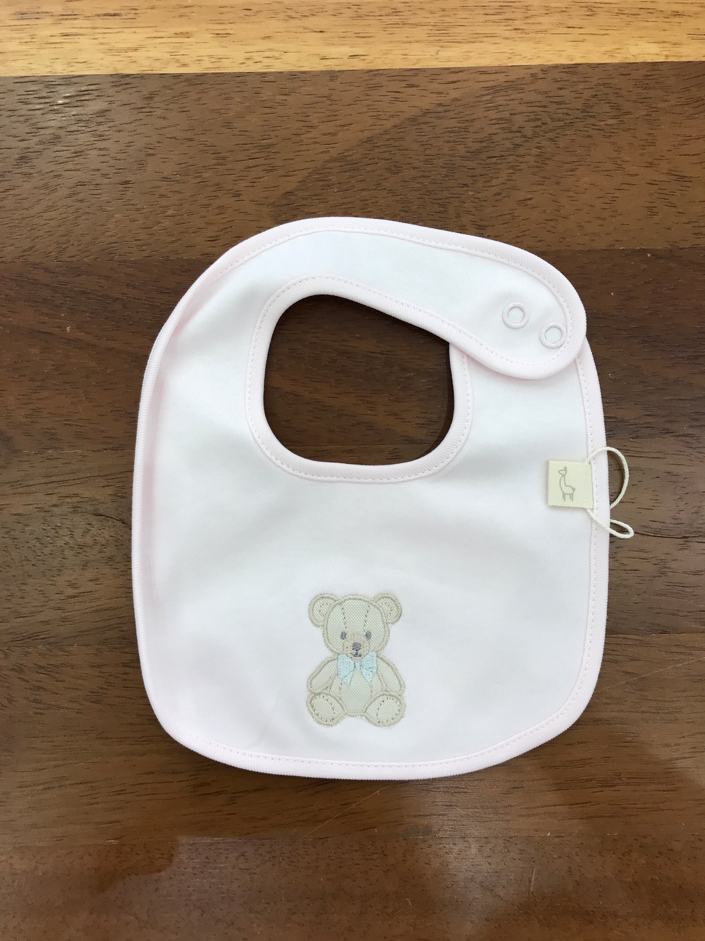 Bavetta Baby Gi in cotone con orsetto ricamato sul davanti