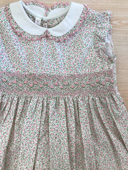 Abito Les Enfants de Gisele in cotone smanicato con rusche colletto bianco con rusche fantasia a fiorellini  con fascia lavorata da punto smock con rose ricamate