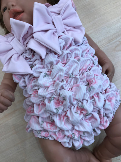 Costume Fofettes con fiorellino rosa e fiocchi sul davanti e sul retro
