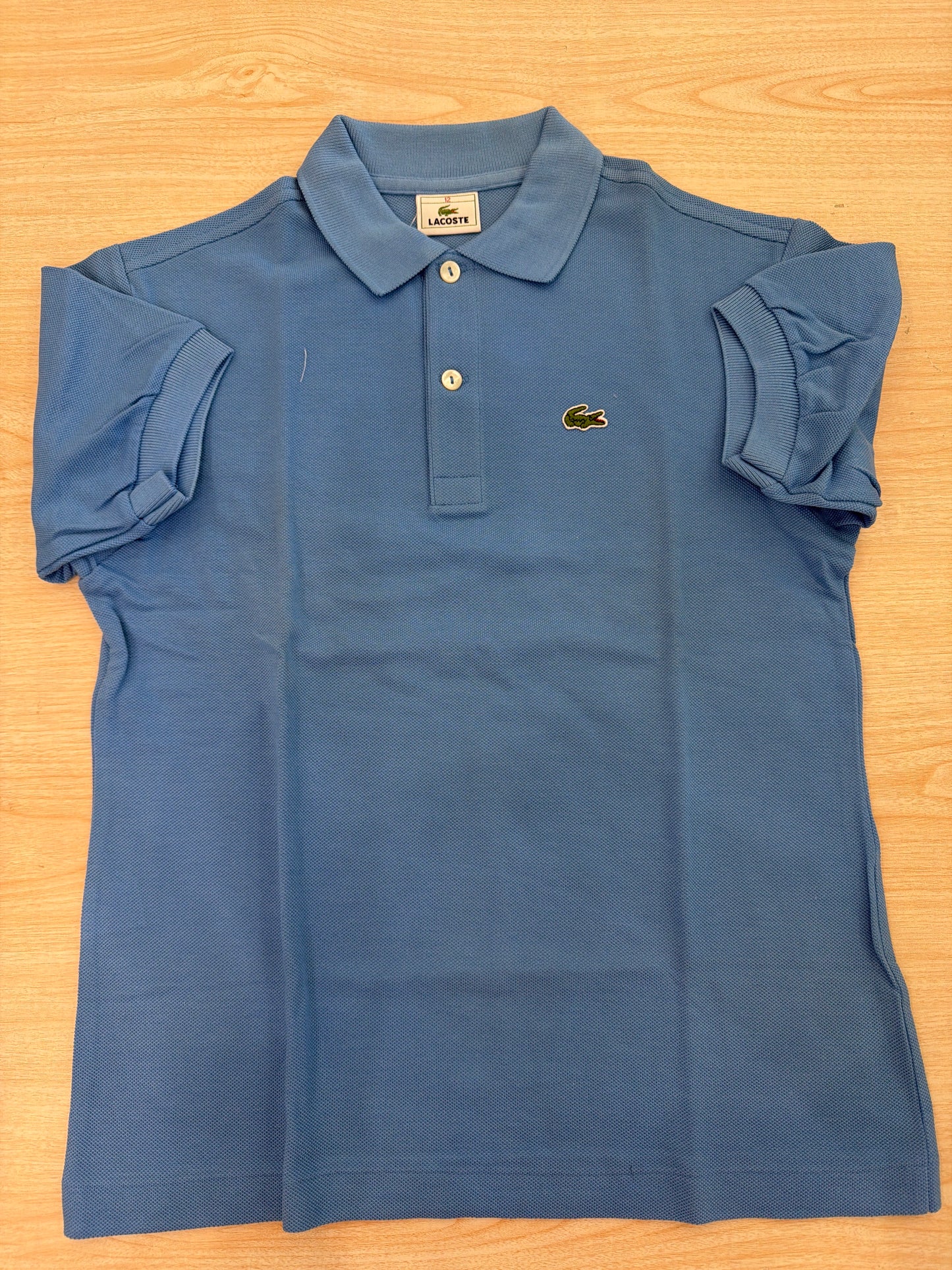 Polo Lacoste in cotone mezza manica con bottoncini e logo ricamato lateralmente unisex