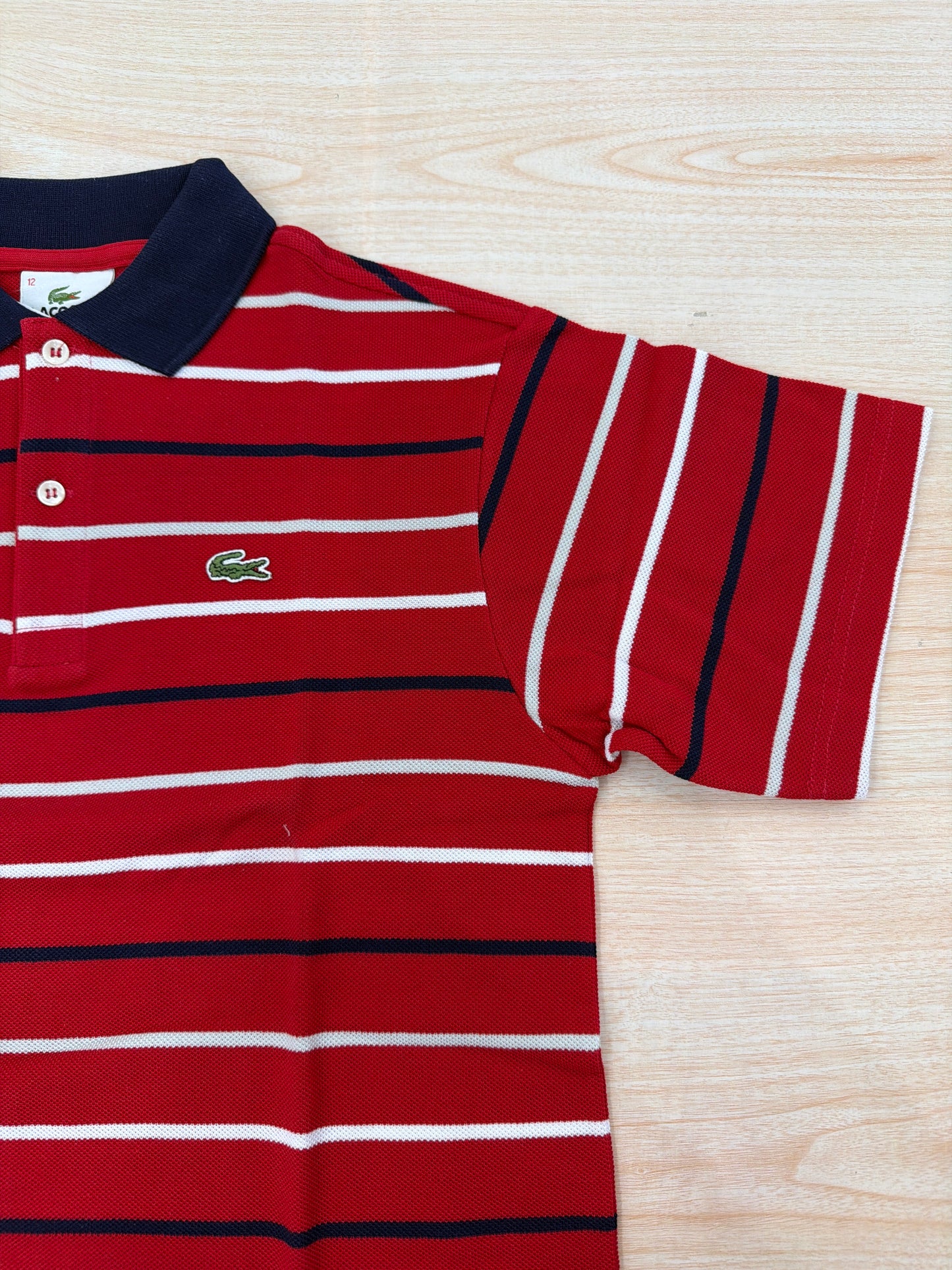Polo Lacoste in cotone mezza manica con bottoncini e logo ricamato lateralmente unisex