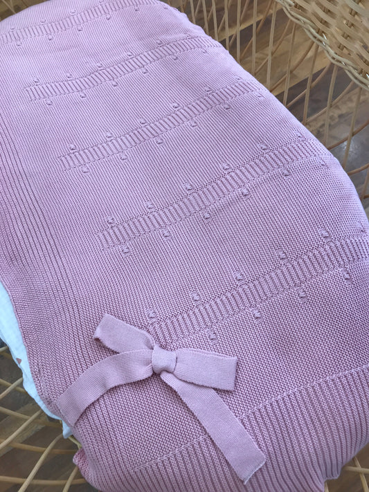 Coperta PCS in filo di cotone rosa con lavorazione a maglia con fiocco laterale