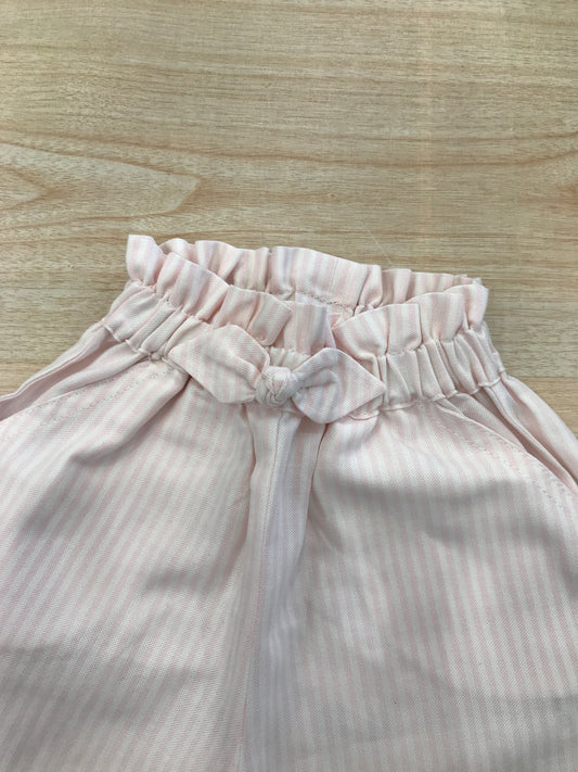 Pantalone Baby Gi in cotone a righe bianche e rosa con fiocchetto ed elastico in vita