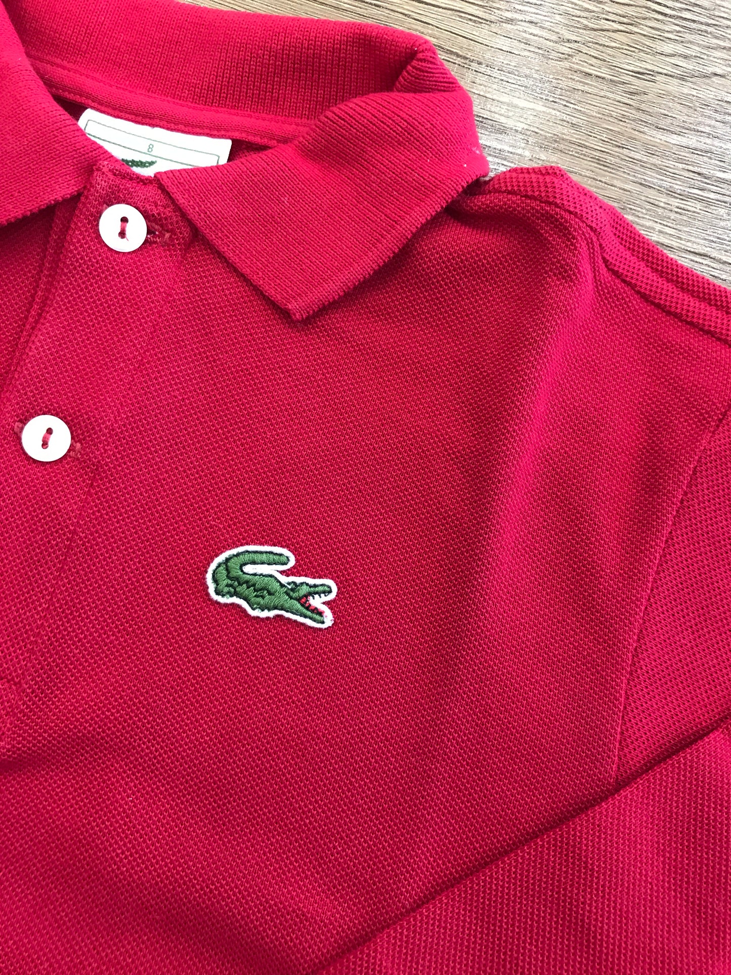 Polo Lacoste manica lunga con polsini e bottoncini