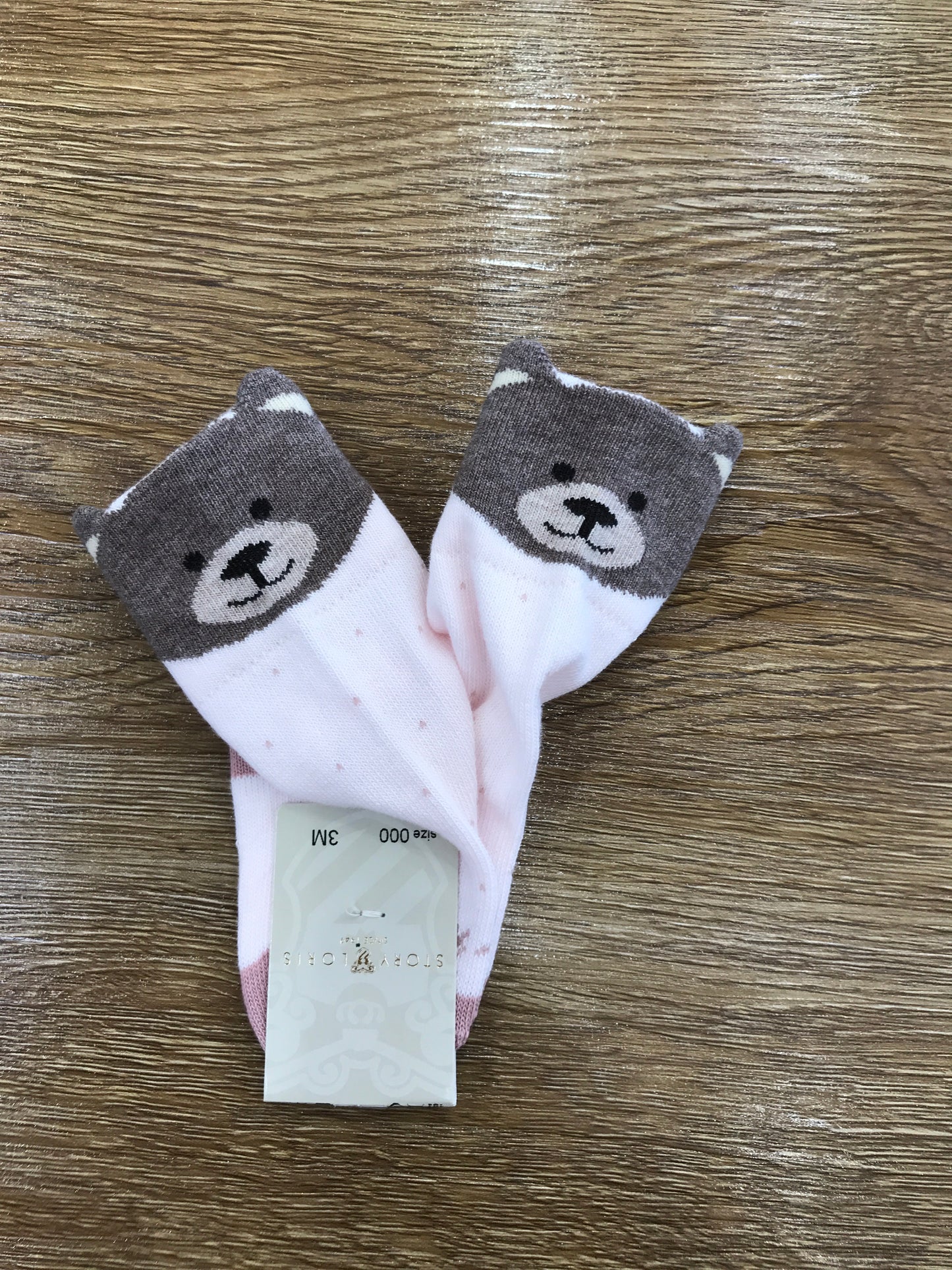 Calzino Story Loris in caldo cotone rosa con piccoli pois ed orsetto