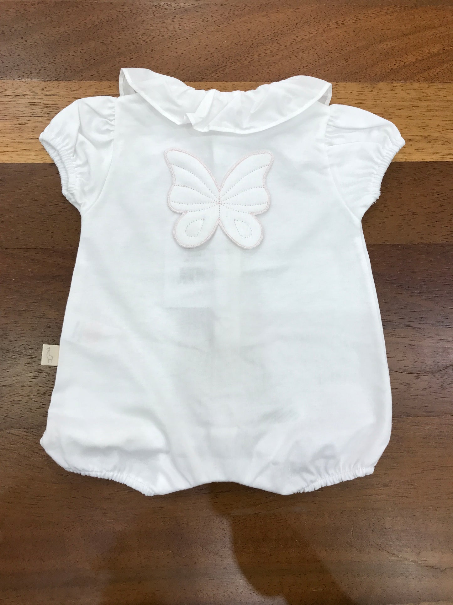 Pagliaccetto Baby Gi in cotone bianco mezza manica collo con rusche bianca