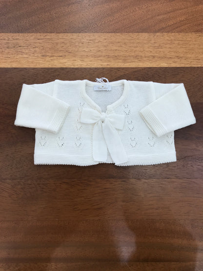 Cardigan Baby Lord in filo panna manica lunga con fiocco e lavorazione sul davanti