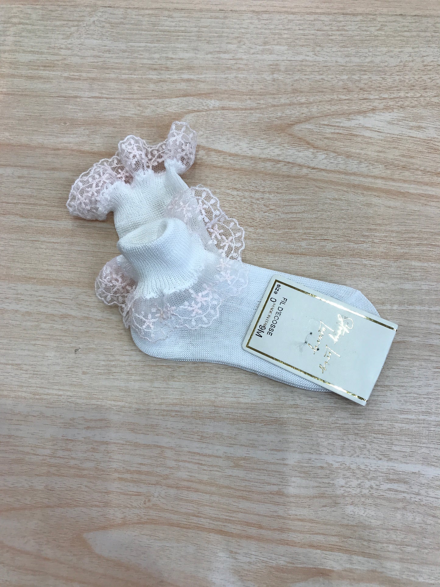 Calzino Story Loris in filo bianco con rusche rosa sul bordo