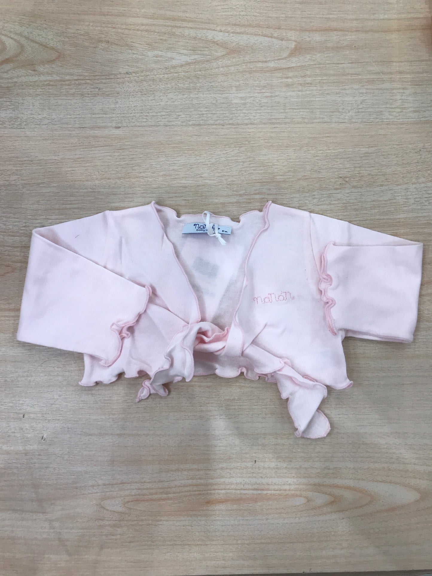 Cardigan Nanan in cotone rosa smerlato con nodino per chiusura