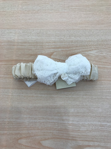 Fascia Le Bebè in cotone con fiocco in pizzo bianco applicato sul davanti
