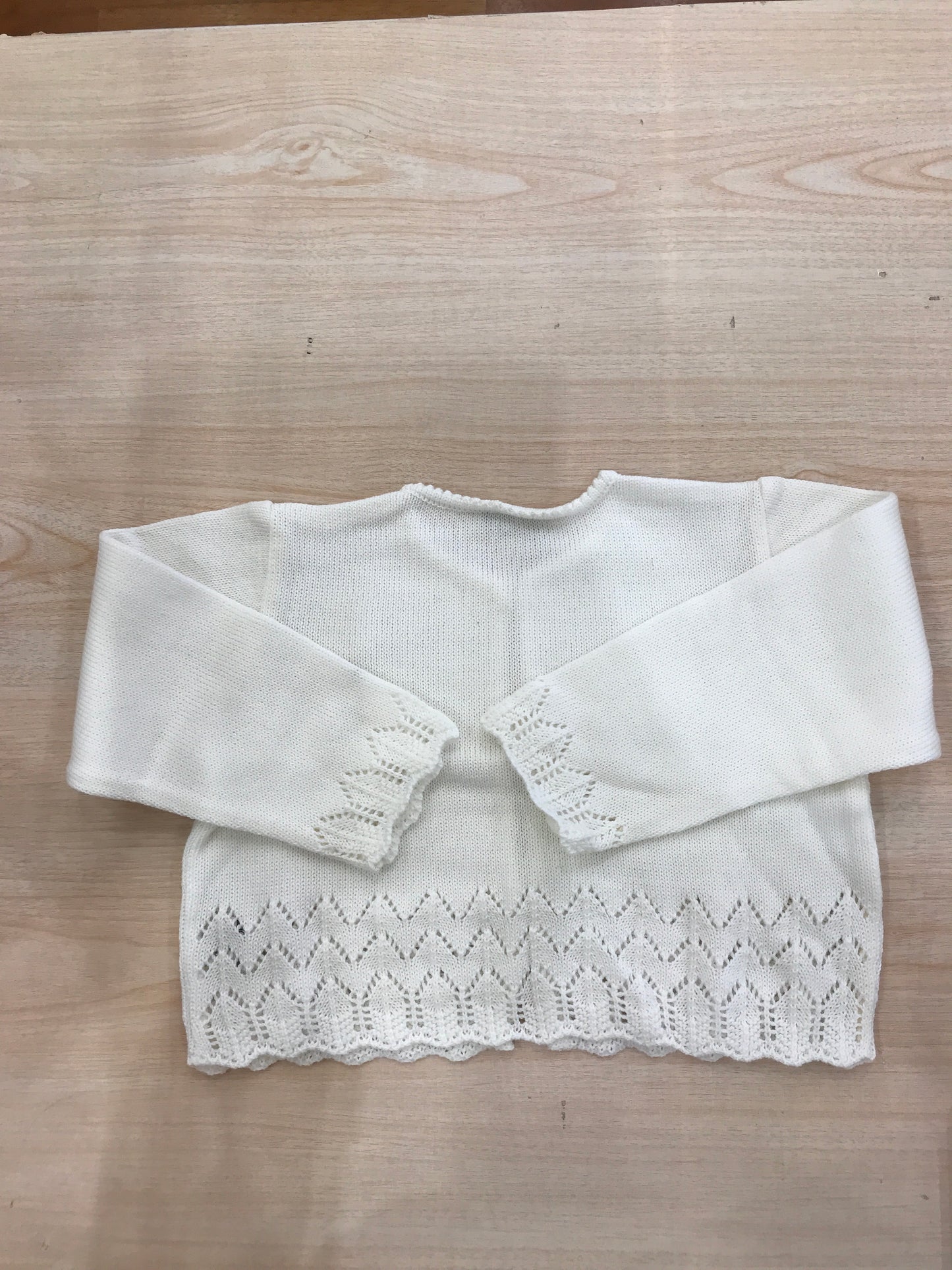 Cardigan Biebi in filo panna con lavorazione in basso