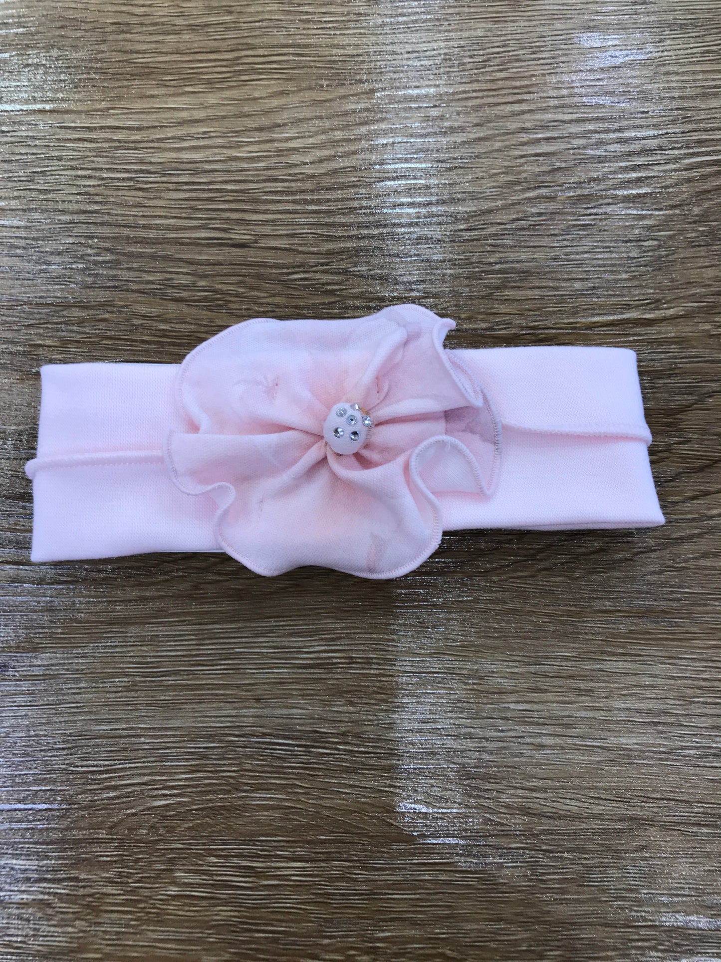 Fascia Sofija in cotone rosa con camelia in rilievo con strass