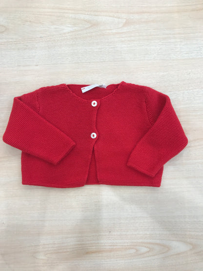 Cardigan Coccodè in filo rosso con due piccoli bottoni sul davanti