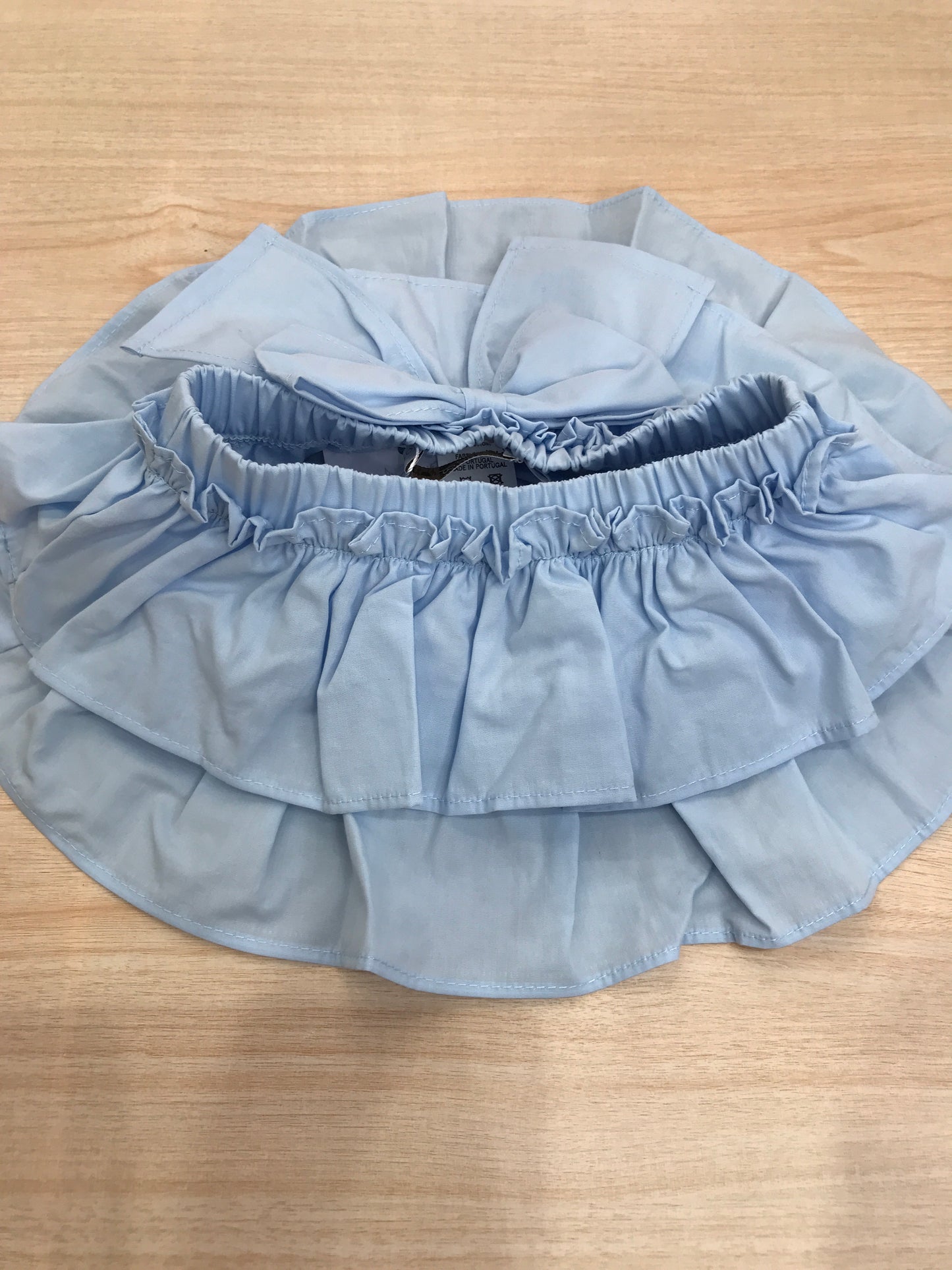 Culotte Fofettes in cotone celeste con rusche e con fiocco sul retro