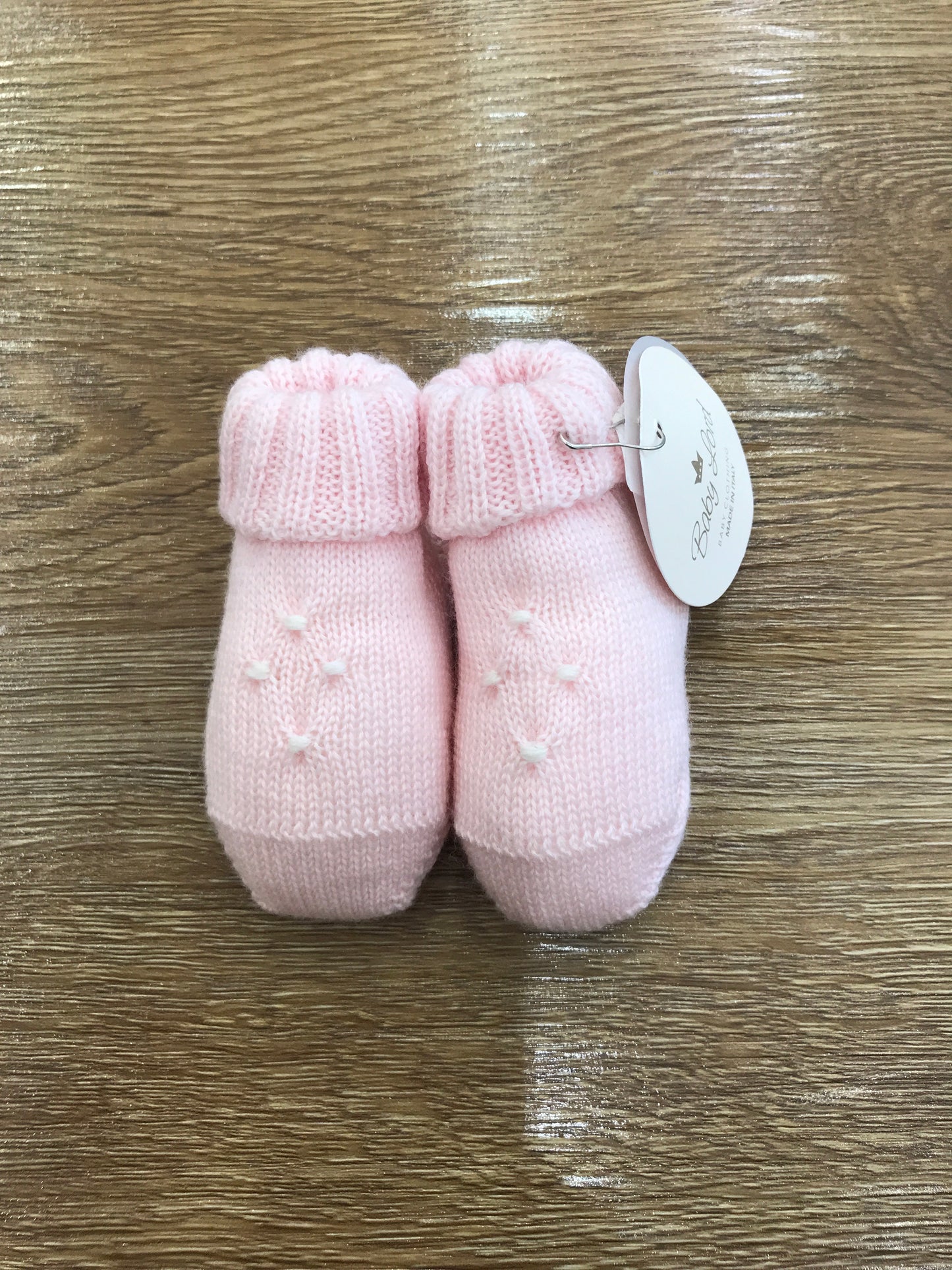 Babbucce Baby Lord in lana rosa con punto smock panna