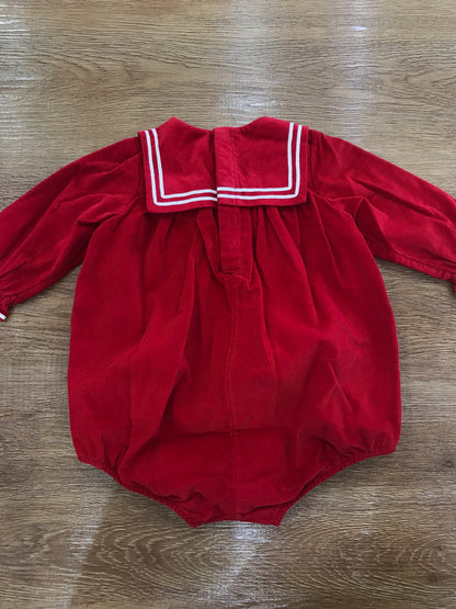 Pagliaccetto Petit Bateau a costine rosso con manica a sbuffo con collo squadrato con piccoli fiocchetti bianchi