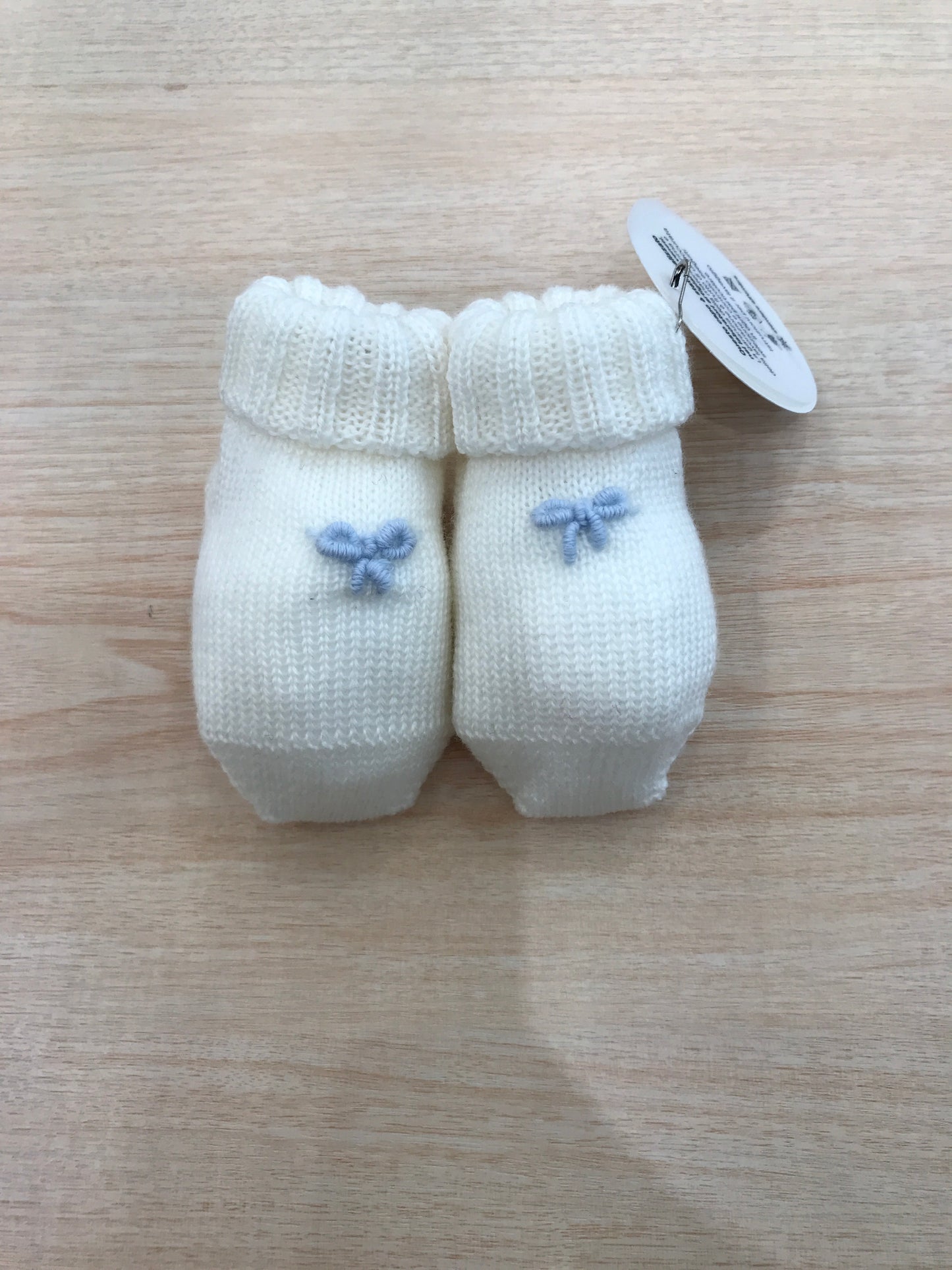 Babbucce Baby Lord in lana panna con nodi d'amore celesti