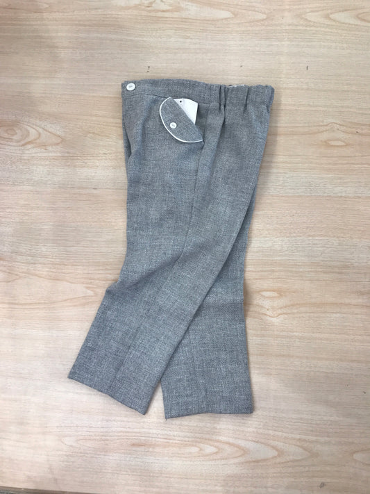 Completo Paz Rodriguez pantalone lungo grigio con camicia bianca a pois con cardigan grigio in lana