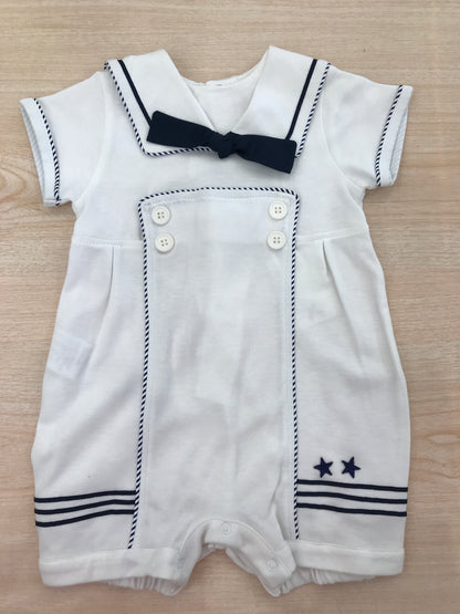Pagliaccetto Cielo Blu in cotone mezza manica stile marinaretto con profilo blu scuro righe in basso con stelline e fiocchetto sul colletto davanti