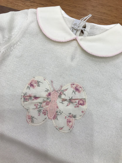 Pagliaccetto Baby Lord in filo panna con collo tondo mezza manica con farfalla centrale