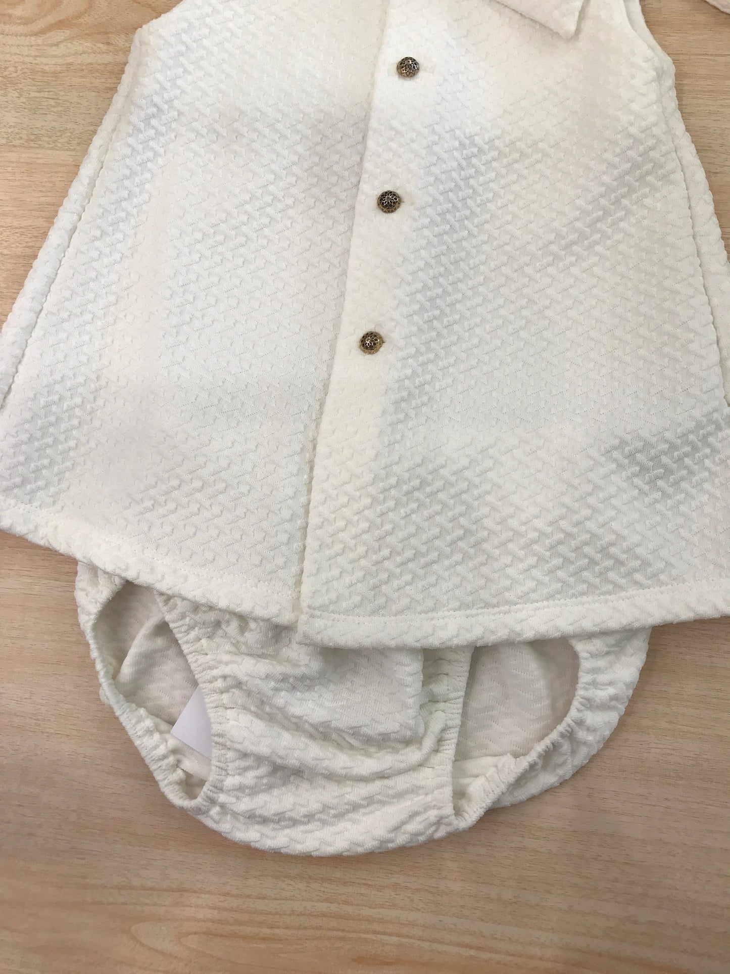 Abito Paz Rodriguez in cotone smanicato con fiocchi sulle spalline con culotte con cuffietta abbinata con laccetti