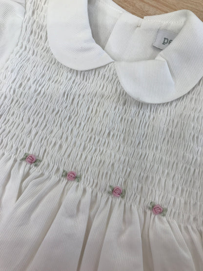 Abito Pepecè in cotone bianco manica a sbuffo con punto smock e roselline glicine