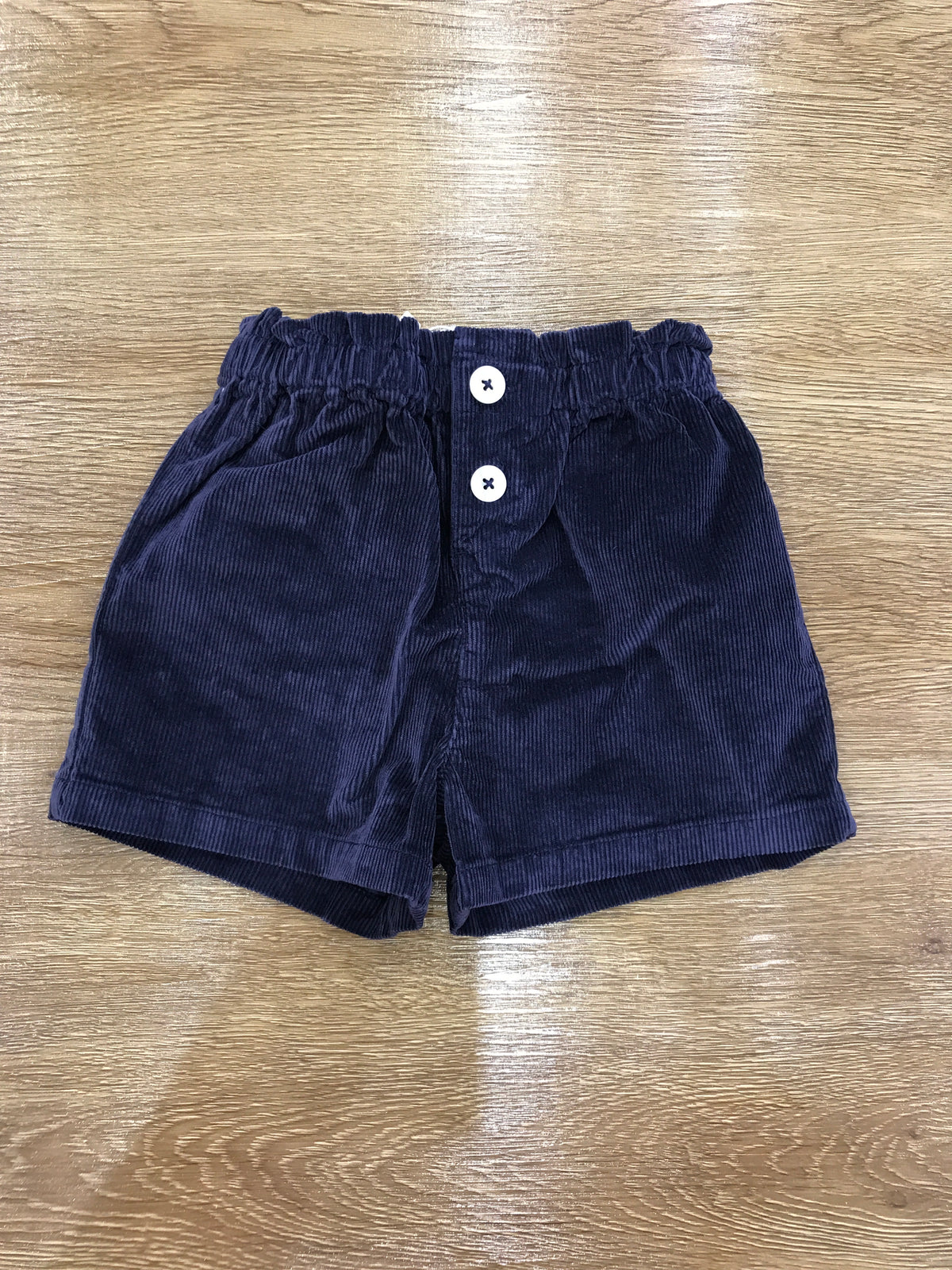 Pantalone Petit Bateau in velluto a coste blu scuro con bottoncini elastico in vita e cuore sul retro