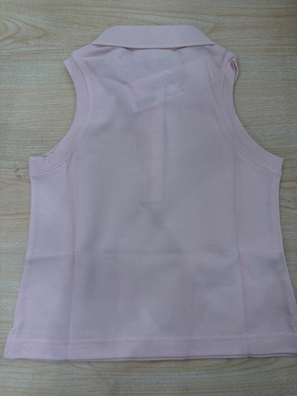 Polo Lacoste in cotone smanicata  con bottoncini e logo ricamato lateralmente
