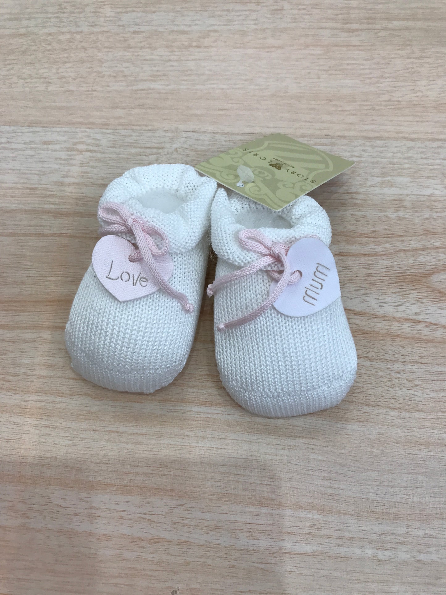 Babbucce Story Loris in filo bianco con cuore e fiocchetto rosa sul davanti