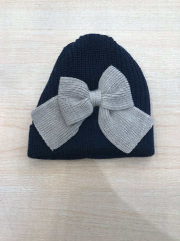 Cappello Baby Lord a costa inglese con risvolto e fiocco applicato al centro