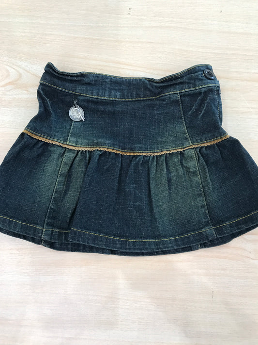 Gonna Baby Dior in jeans scuro con balza con tasche sul retro
