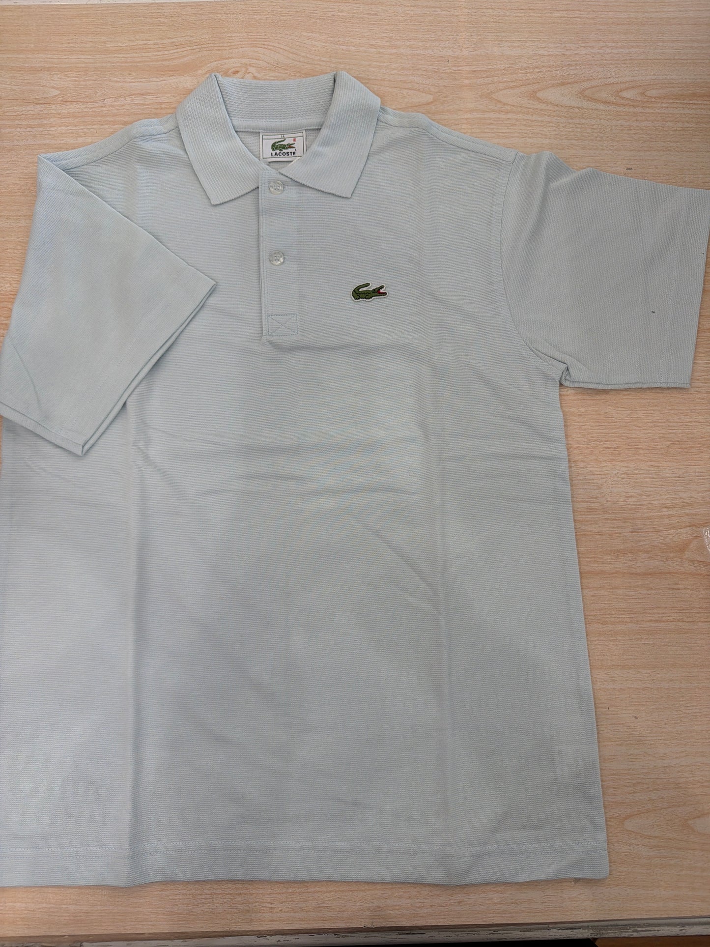 Polo Lacoste in cotone mezza manica con bottoncini e logo ricamato lateralmente unisex