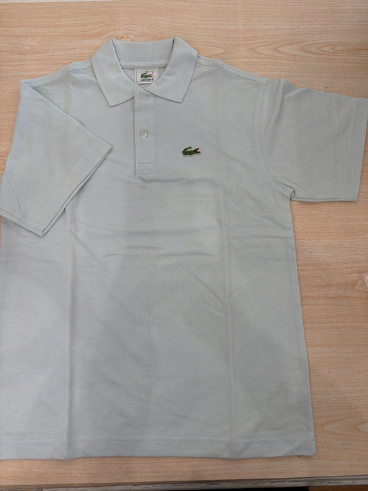 Polo Lacoste in cotone mezza manica con bottoncini e logo ricamato lateralmente unisex