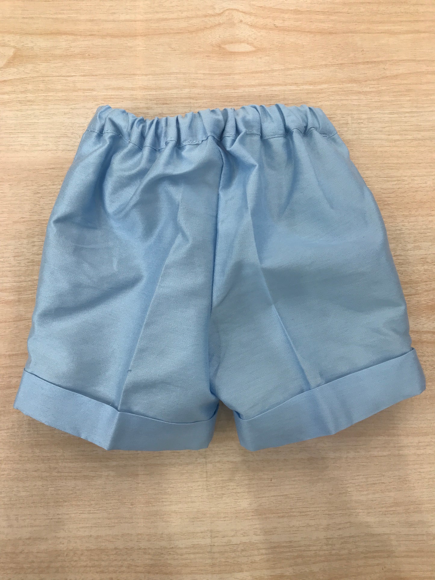 Bermuda Les Enfants de Gisele in saten con tasche a profilo sul davanti